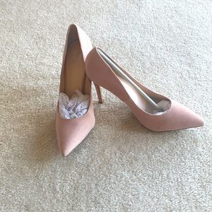Brand new pink suede pumps.